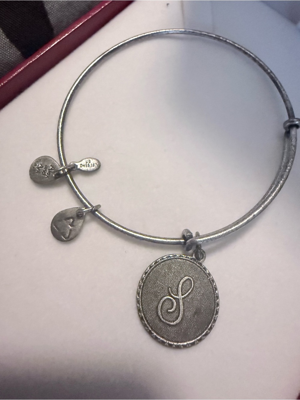 Alex and Ani Initial "S" charm bangle is a silver-tone, expandable bracelet
